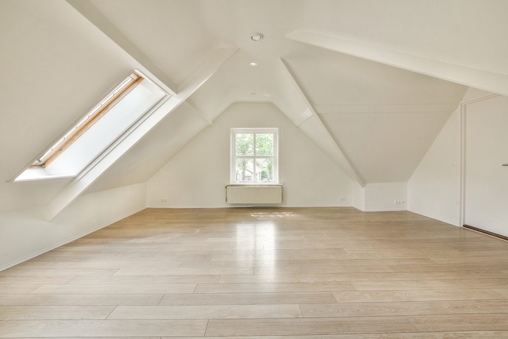 Spacious, modern loft conversion with a skylight and cosy seating area