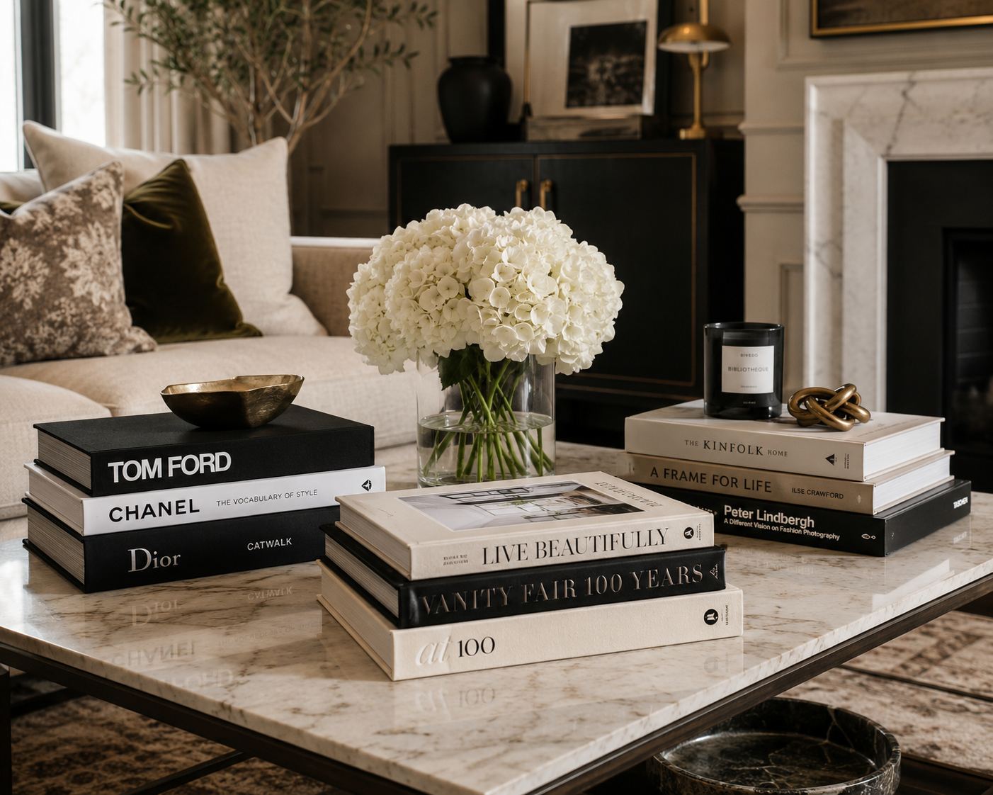 A meticulously curated coffee table featuring an array of aesthetically pleasing coffee table books, enhancing the room's elegance.
