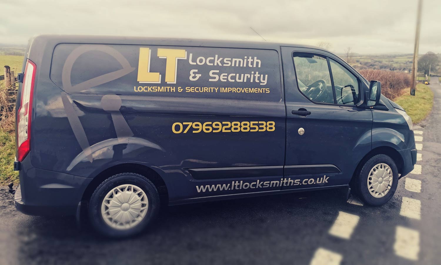 A local locksmith's van parked in a neighbourhood, emphasising community presence.