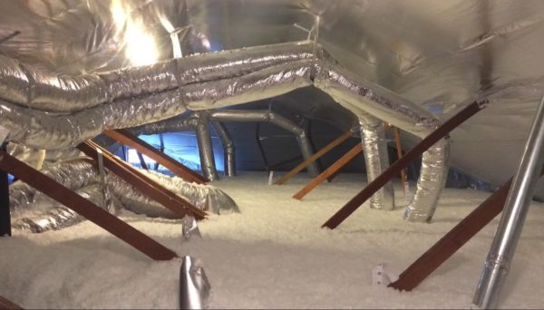 Well-maintained radiant barrier in attic